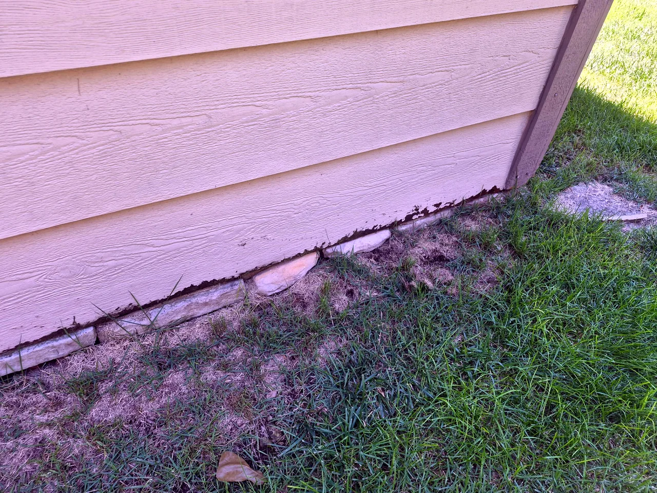 Chipping Paint Above Stone Border — Before — Grand Lake, OK