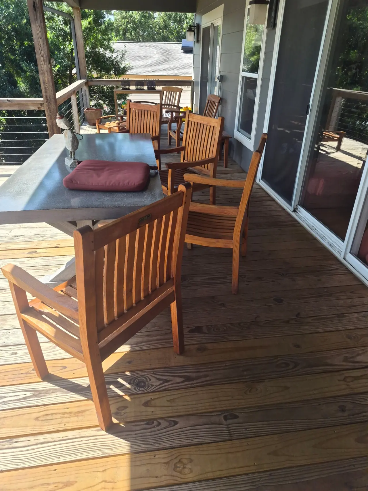 Lakefront Teak Furniture Refinishing — Full patio set refinished and protected.