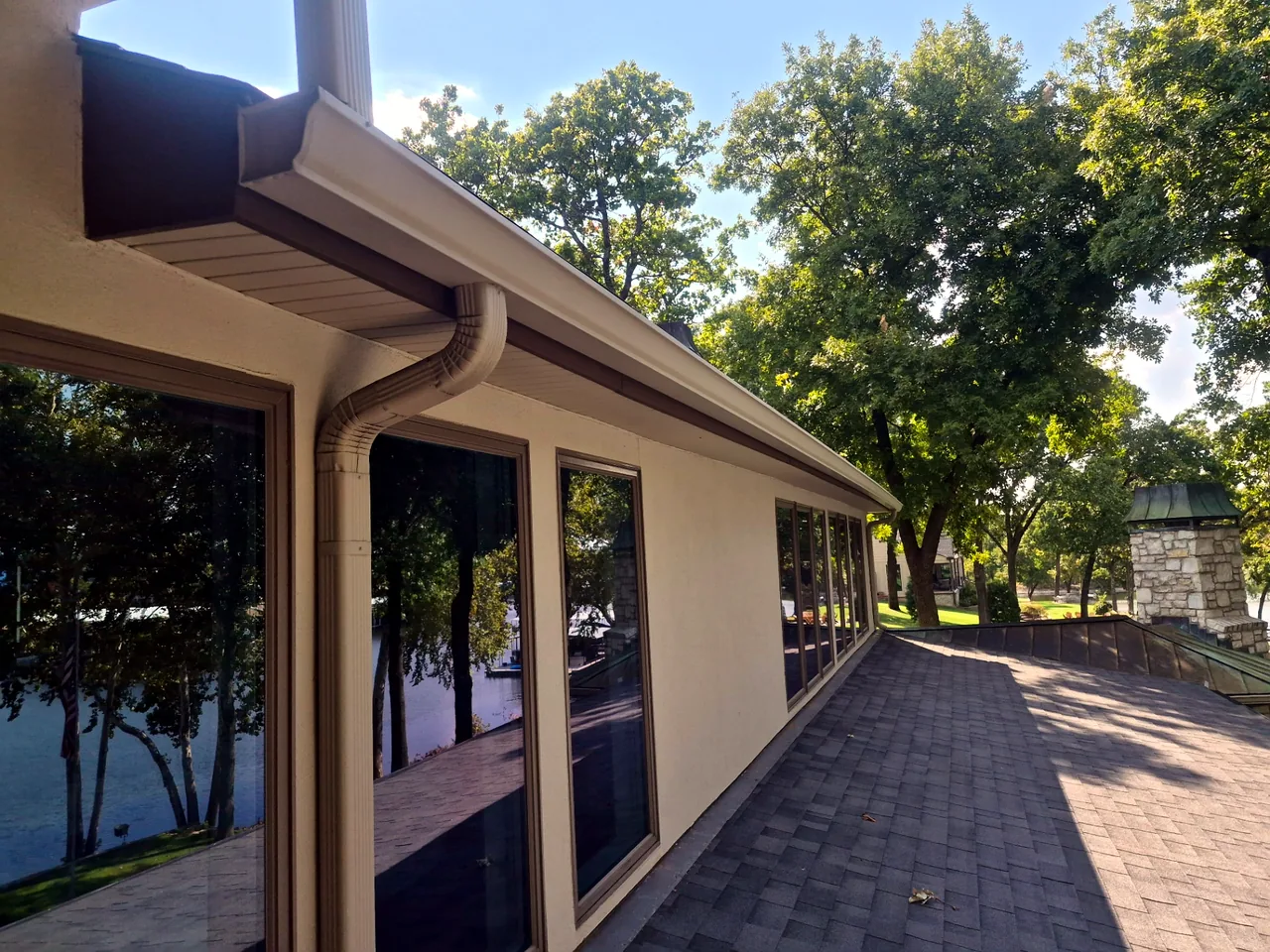 Vinyl Soffit & Guttering Cleaned — After — Grand Lake, OK