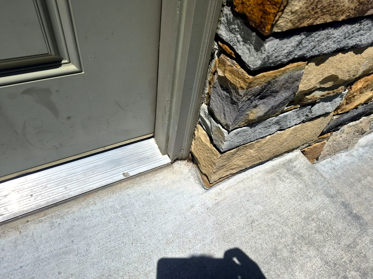 Threshold Seal at Stone Corner — Before — Grand Lake, OK