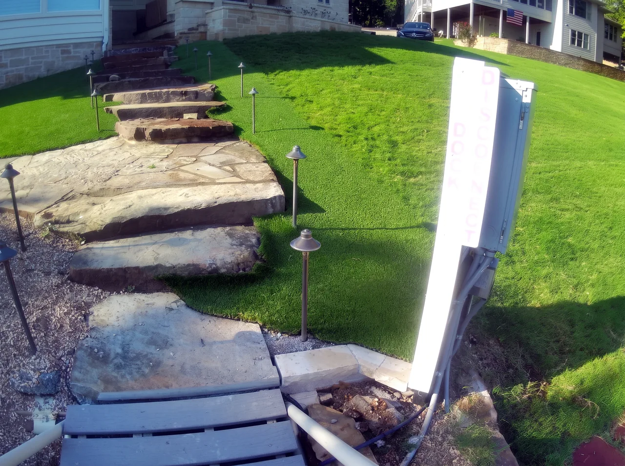 Turf Inlay Around Stone Staircase — After — Grand Lake, OK