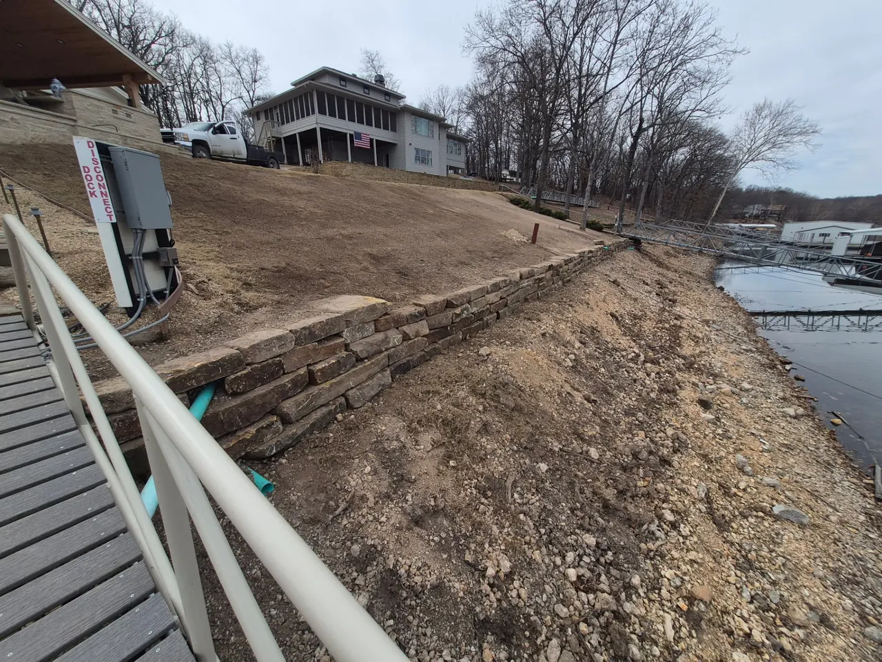 Grand Lake Seawall Rebuild — Regraded slope and restored shoreline access.