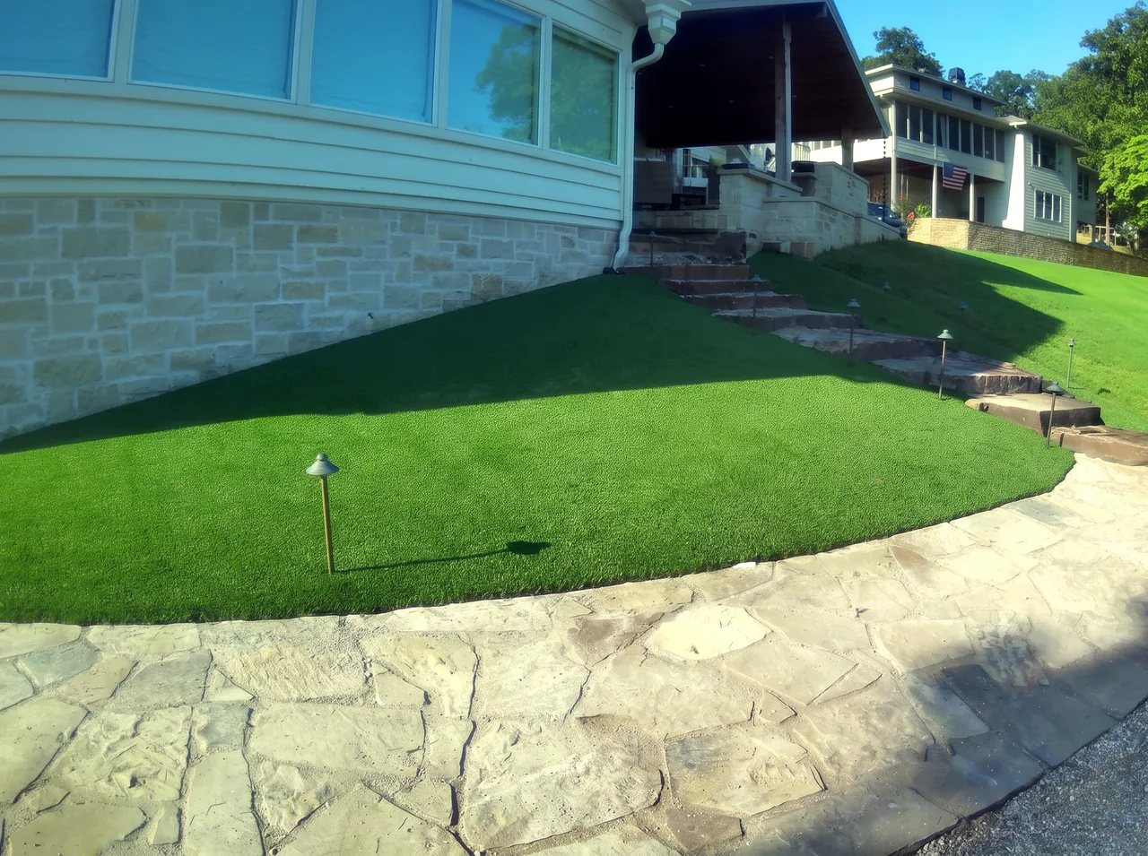 Seamless Turf Lawn at Stone Patio — After — Grand Lake, OK