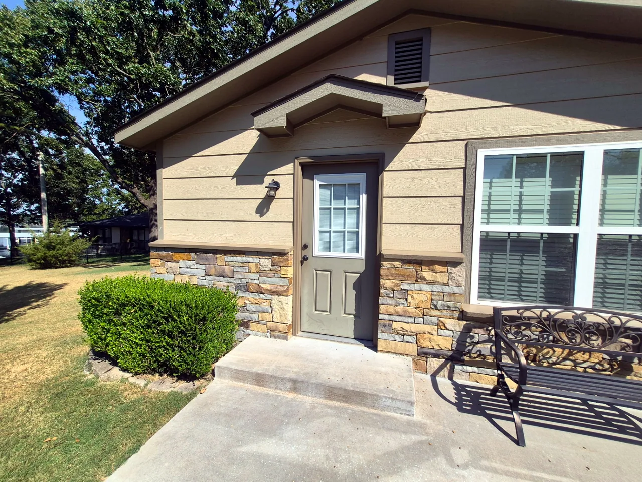 Entry Door, Trim & Stone Finished — After — Grand Lake, OK