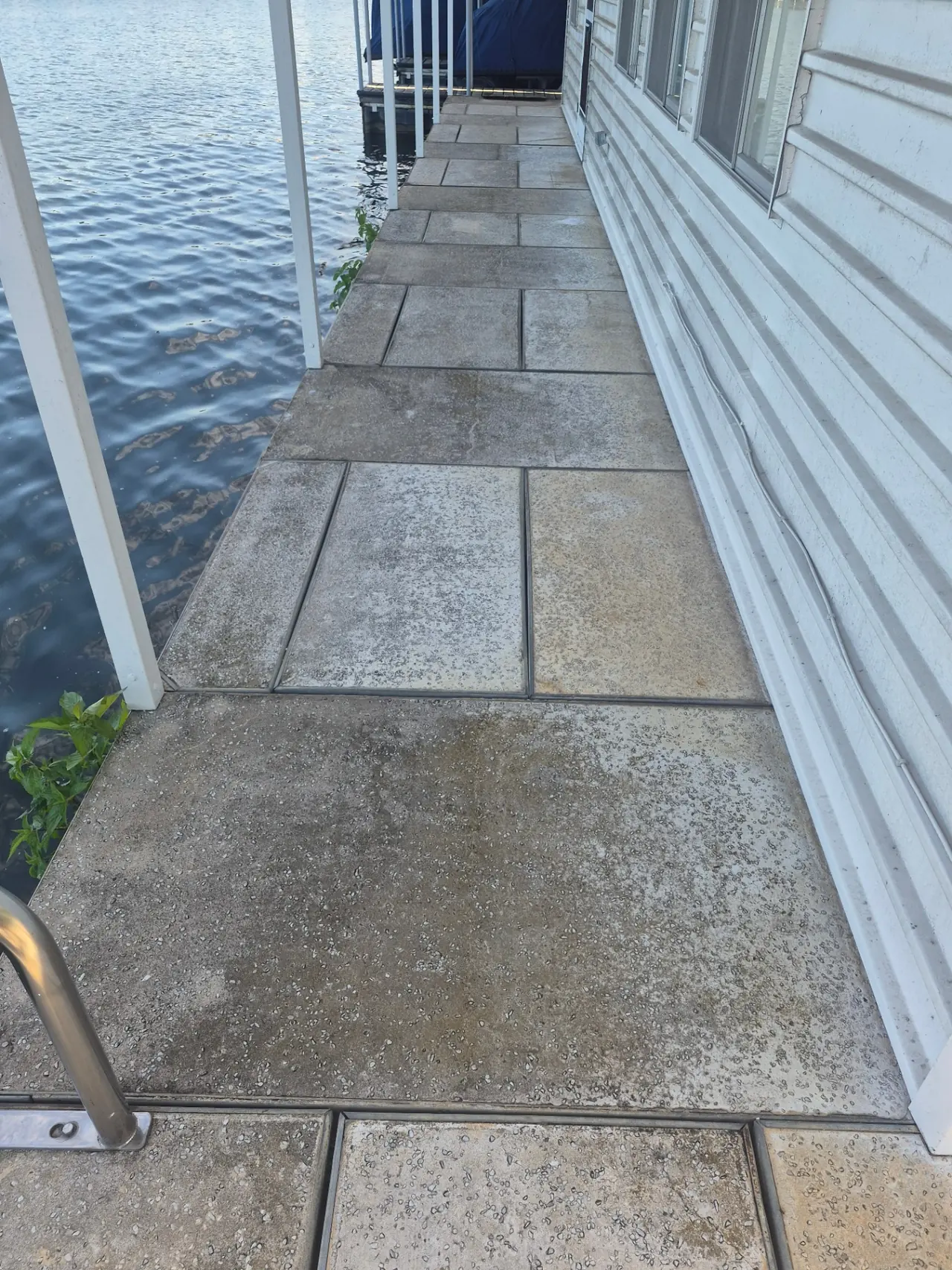 Boathouse & Walkway Restoration — Dock walkway stained from lake water and mildew.