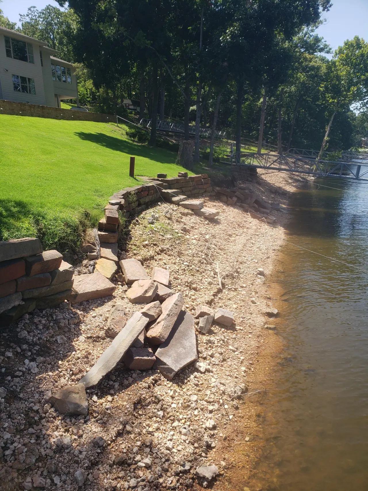 Collapsed Stacked Rock Wall — Before — Grand Lake, OK