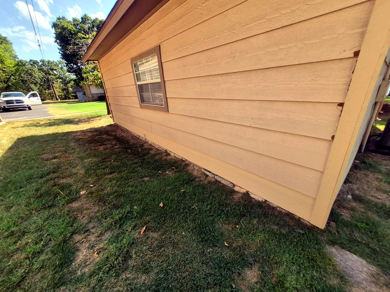 Side Elevation Siding Replaced, Unpainted — In Progress — Grand Lake, OK
