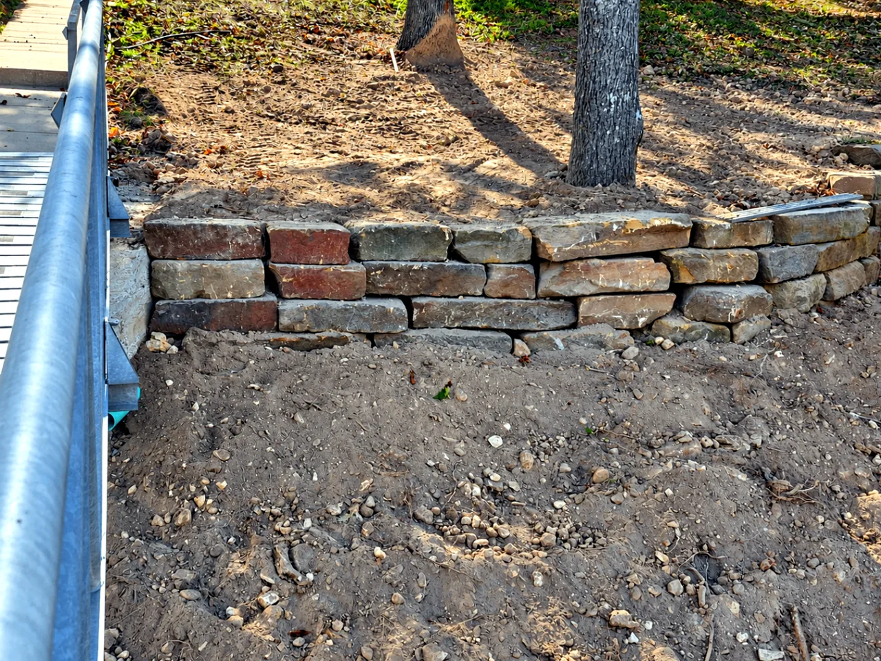Finished Boulder Wall with Regraded Bed — After — Grand Lake, OK