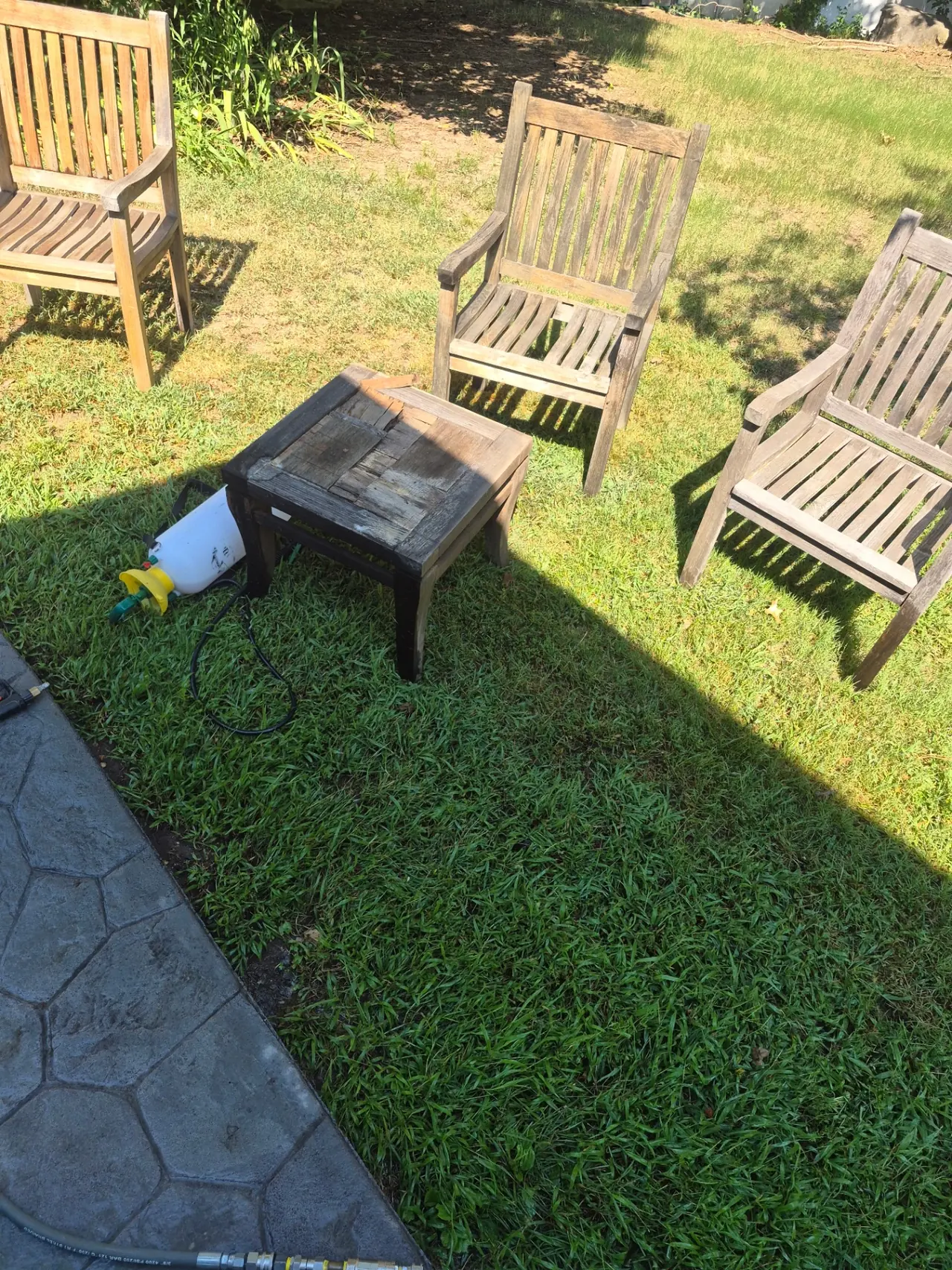 Lakefront Teak Furniture Refinishing — Sun-bleached teak surfaces.