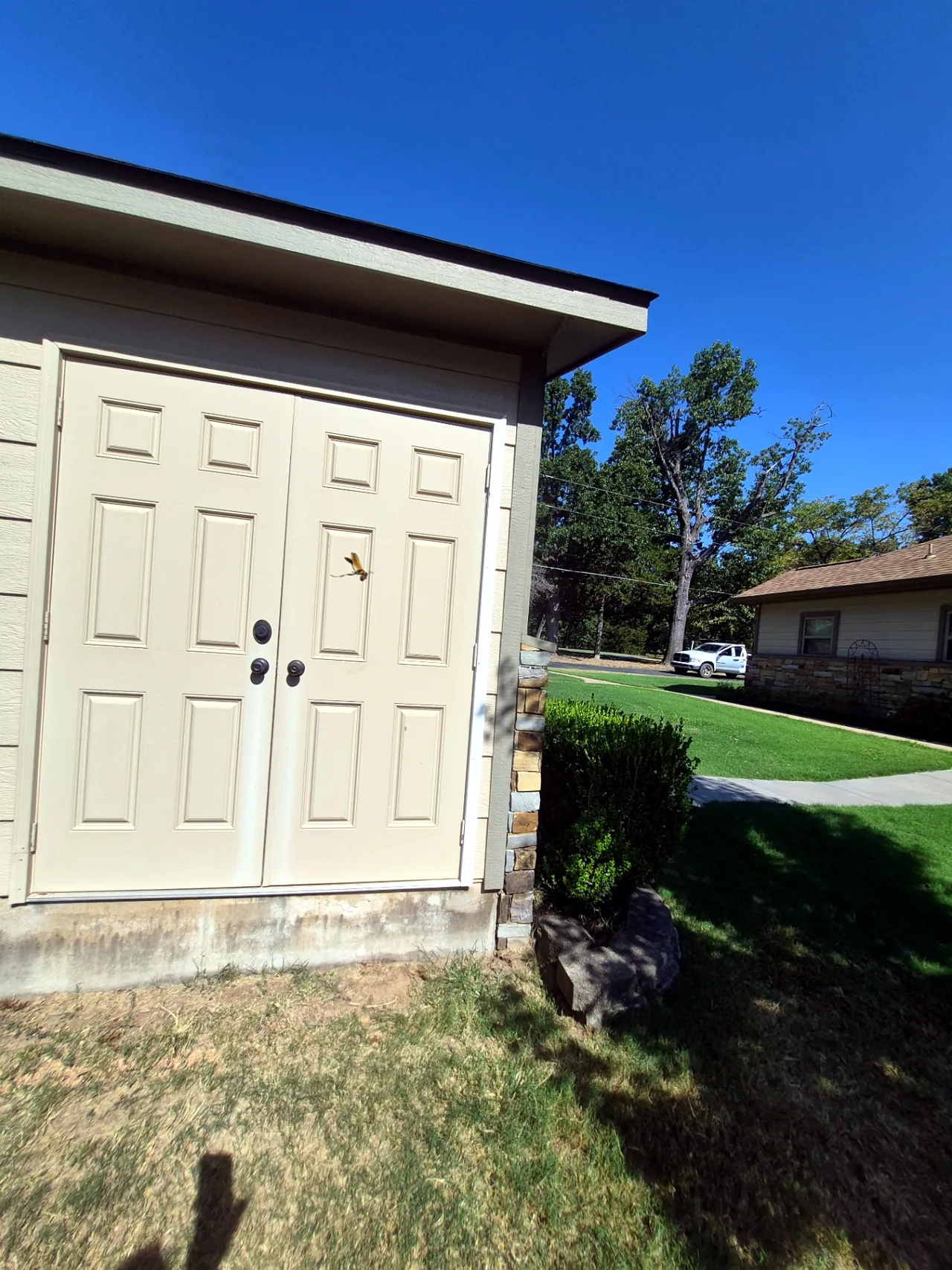 Storage Doors & Trim Repaired, Unpainted — In Progress — Grand Lake, OK