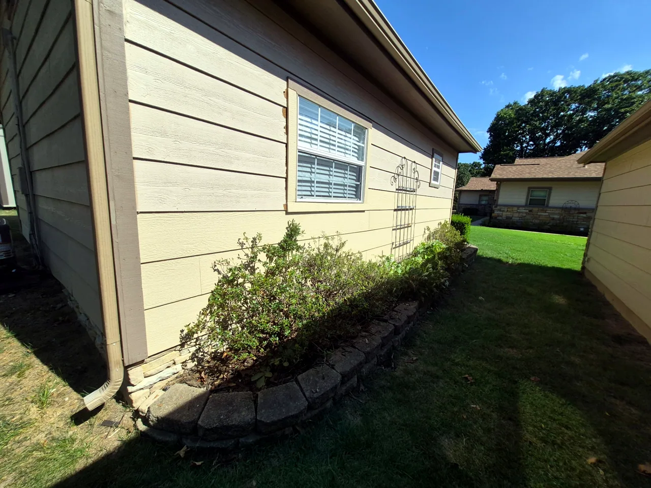 Window Wall Siding Repaired, Unpainted — In Progress — Grand Lake, OK
